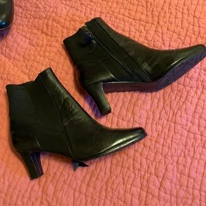 Black ankle booties. Never worn.